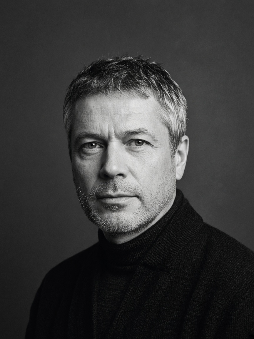 Black and white editorial portrait of Marc Dubois